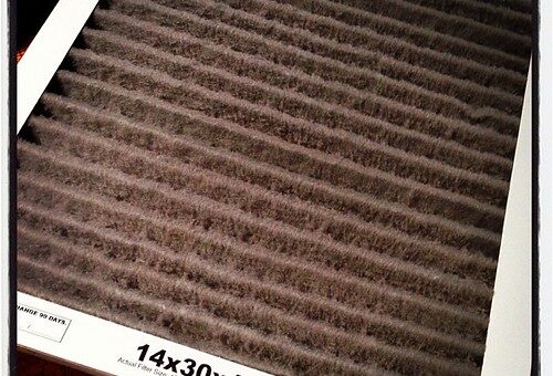 Photo réaliste illustrant filtre vmc en rénovation et ventilation