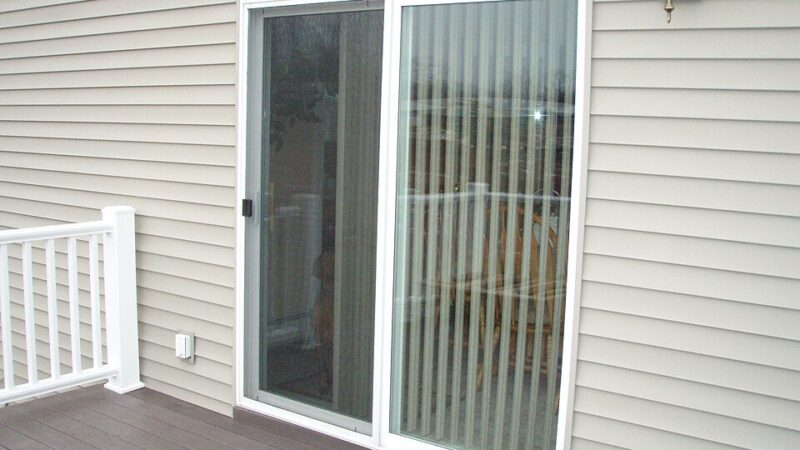 Photo réaliste pour porte fenetre coulissante en rénovation de menuiserie