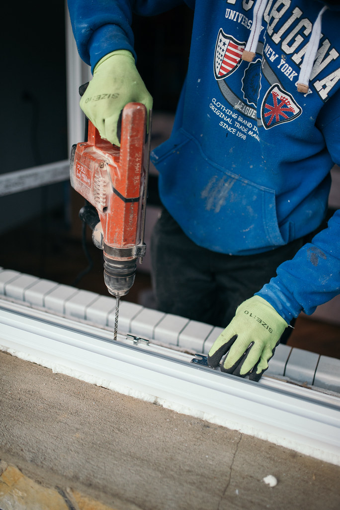 Photo réaliste pertinente pour pose fenetre en rénovation de fenêtre