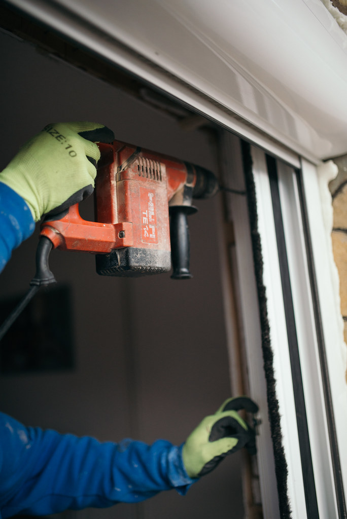Photo réaliste pertinente pour pose fenetre en rénovation de fenêtre